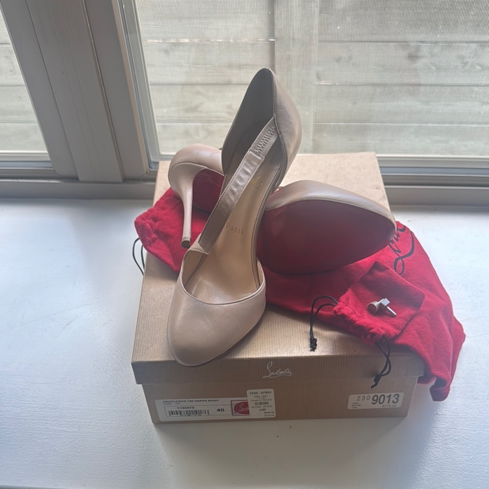 Christian Louboutin Cream Heels with Sophisticated Style